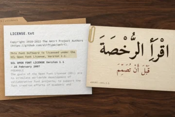 Kraft folder with Amiri’s LICENSE.txt on a walnut desk, beside a card reading “read the license before you design” in Arabic